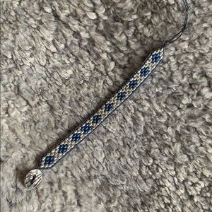 Adjustable Beaded bracelet - 7.5-8.5”. 1/2” wide.